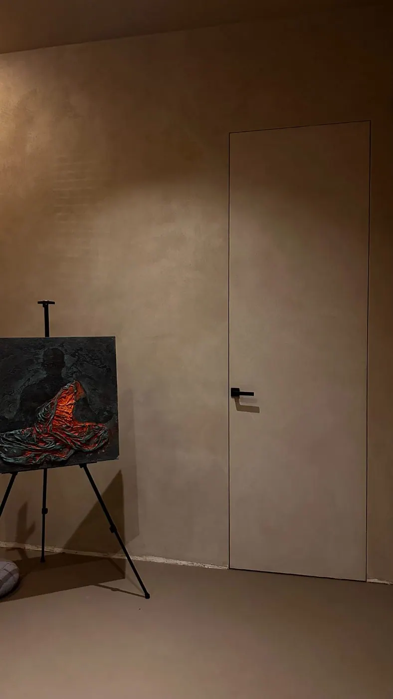 Concealed door in a gallery wall