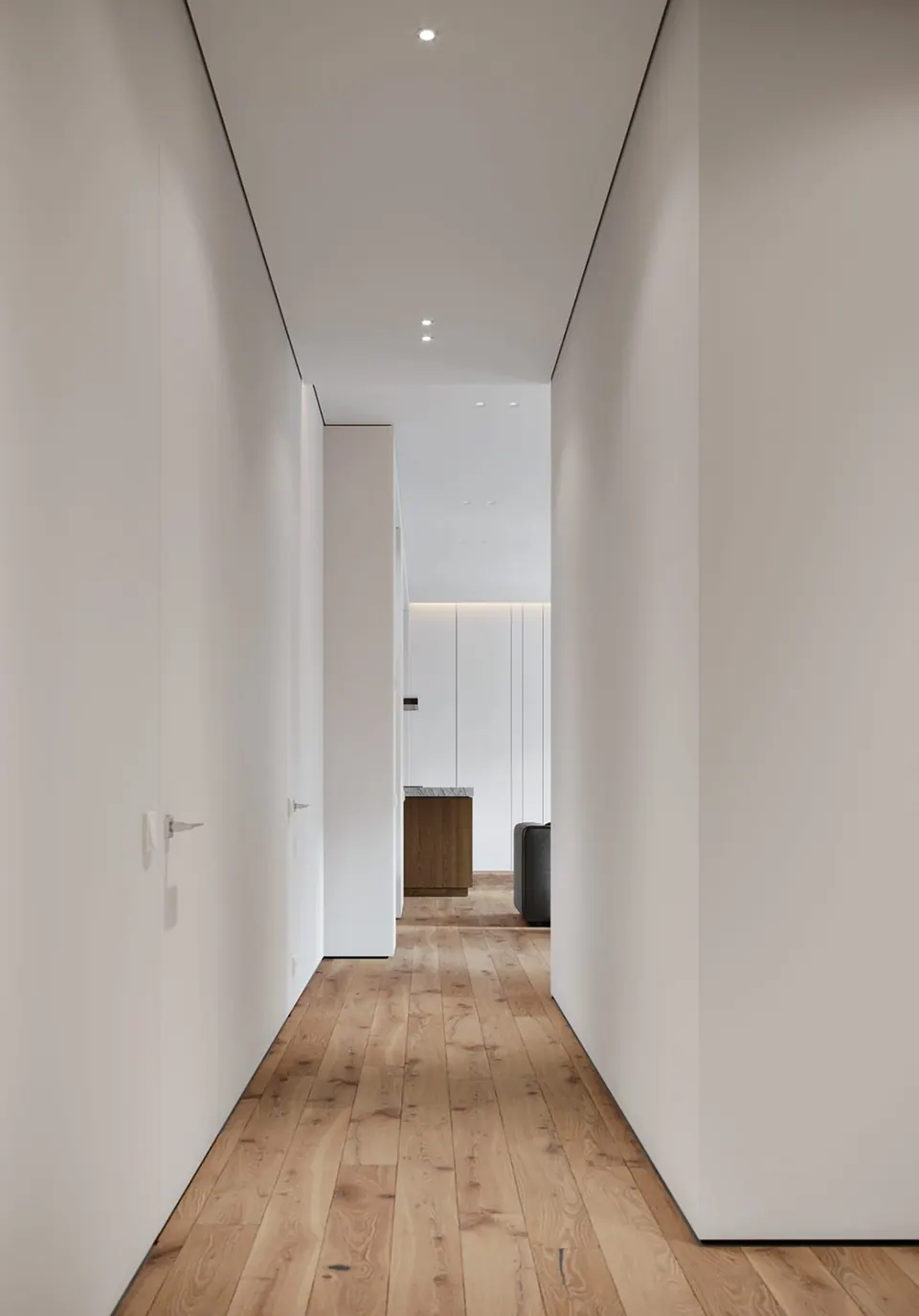 Corridor — flush walls and concealed doors