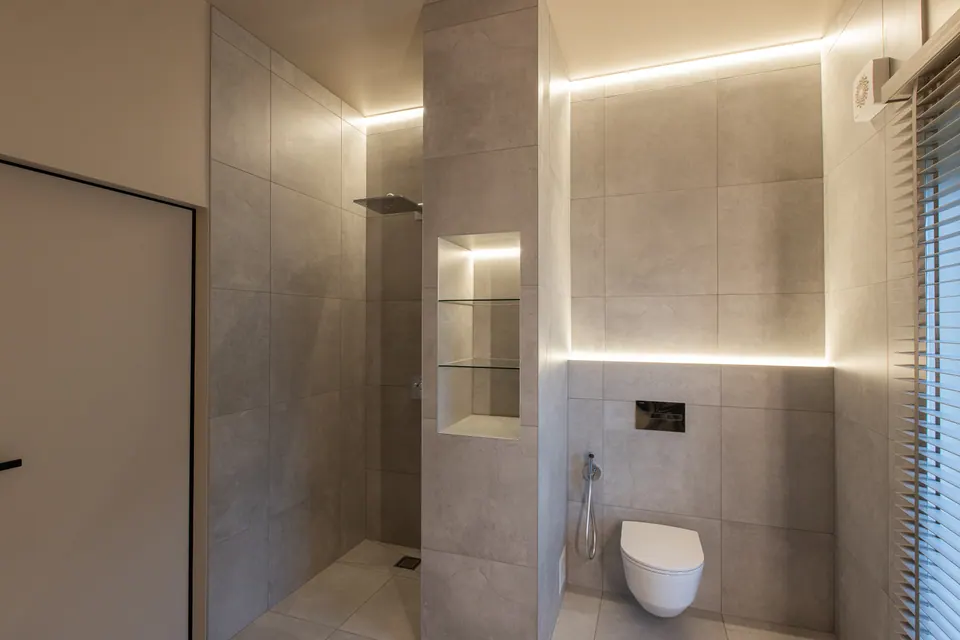 Bathroom — LED shadow line framing the shower niche